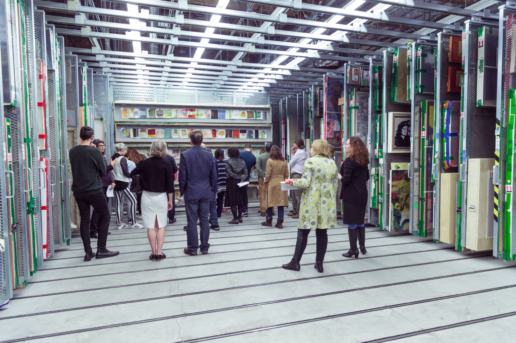 Staff tour of art storage at the Collections Center